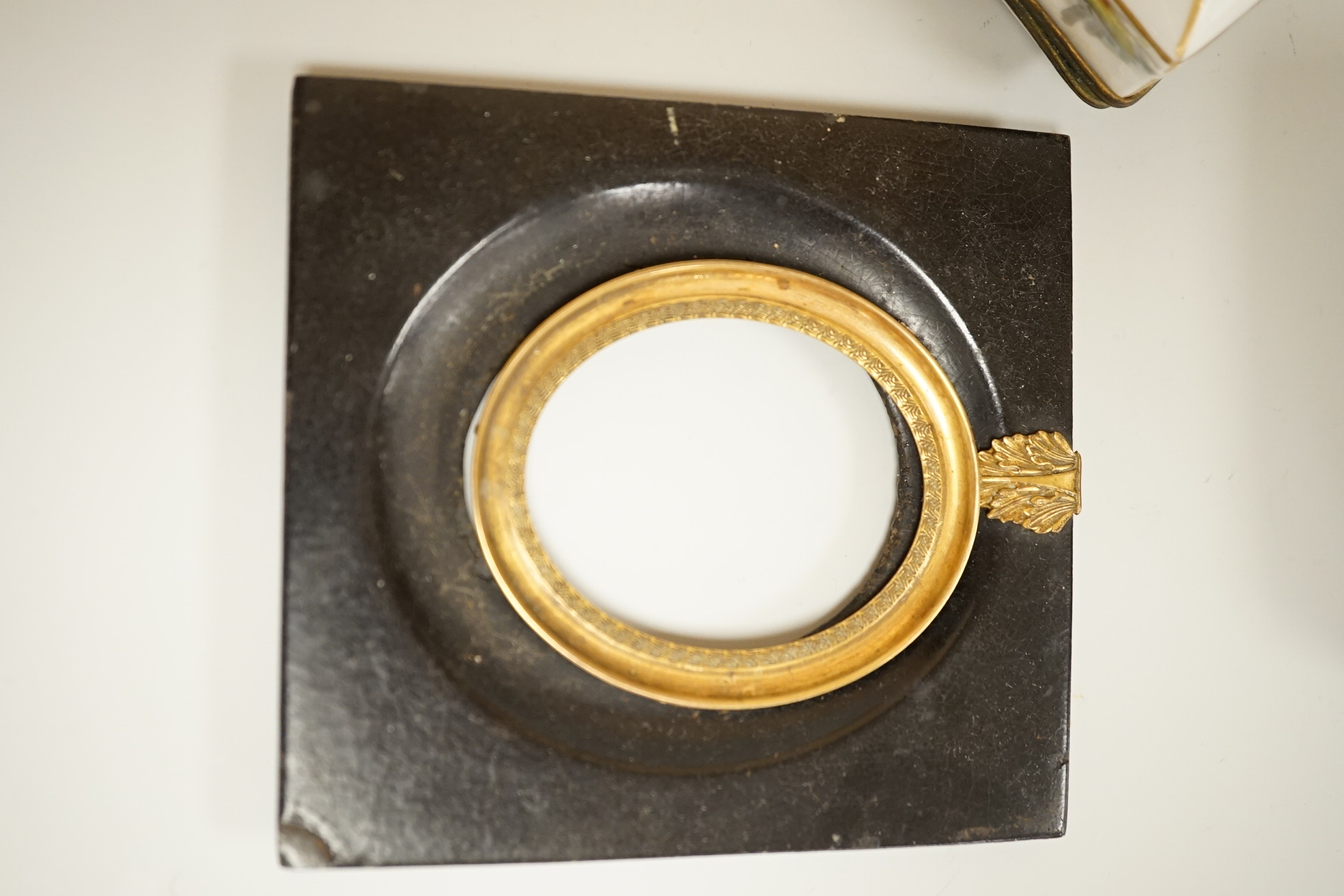 A collection of 19th century and later snuff and pill boxes, a silhouette frame and a gilt metal frame